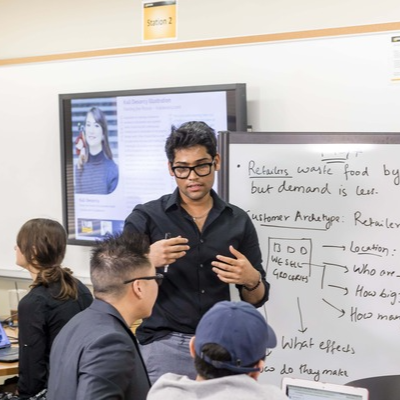 Student teaching a class.